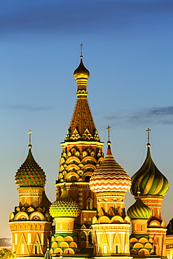 The onion domes of St. Basil's Cathedral in Red Square illuminated at night, UNESCO World Heritage Site, Moscow, Russia, Europe