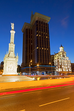 Statue of Columbus in Plaza de Colon at night, Madrid, Spain, Europe