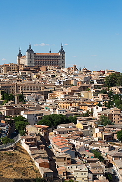 The Alcazar towering above the rooftops of Toledo, UNESCO World Heritage Site, Castilla la Mancha, Spain, Europe