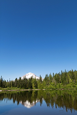 Mount Hood, part of the Cascade Range, reflected in the still waters of Mirror Lake, Pacific Northwest region, Oregon, United States of America, North America