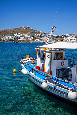 Traditional fishing boat moored in the harbour at Ornos Beach, Mykonos, The Cyclades, Aegean Sea, Greek Islands, Greece, Europe