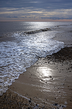 Waves on the shoreline of the North Sea at Southwold beach.