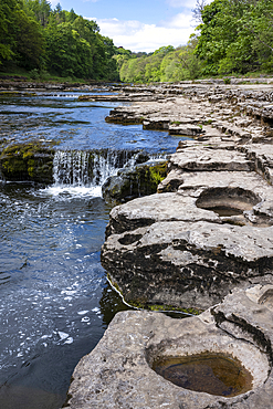 Flowing water of the River Ure at Aysgarth Falls In the Yorkshire Dales National Park.