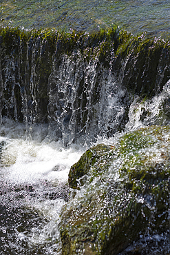 Flowing water of the River Ure at Aysgarth Falls In the Yorkshire Dales National Park.