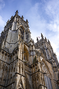 Looking up at the ornate facade and towers of York Minster in the ancient city of York, In the county of Yorkshire.