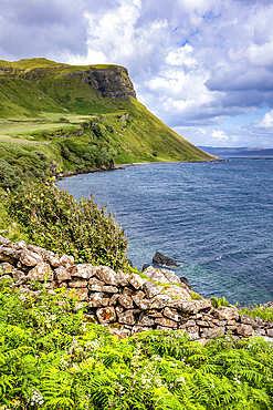 Coastline and cliffs near Portree on the Isle of Skye, Inner Hebrides, Scotland.