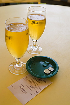 Beer on the bar, with bill and change, Languedoc, France, Europe