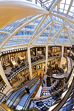 Spiral staircase and decorative floor tiles in luxury shopping centre, Quartier 206 on Friedrichstrasse, Berlin, Germany, Europe