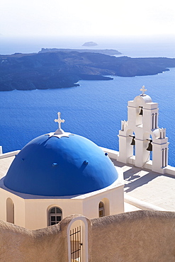 Bell Tower of Orthodox Church overlooking the Caldera in Fira, Santorini (Thira), Cyclades Islands, Aegean Sea, Greek Islands, Greece, Europe