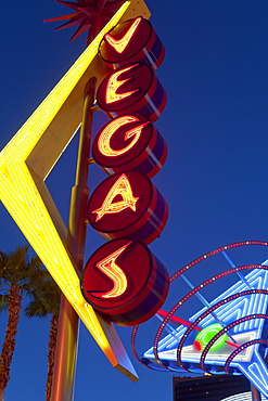 Neon Vegas sign at dusk, Downtown, Freemont East Area, Las Vegas, Nevada, United States of America, North America