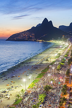 Sunset over Ipanema Beach and Dois Irmaos (Two Brothers) mountain, Rio de Janeiro, Brazil, South America