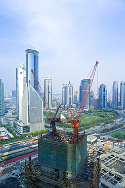 Modern skyscrapers and new construction in the Lujiazui financial district of Pudong, Shanghai, China, Asia