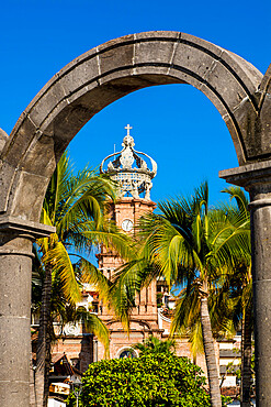 Our Lady of Guadalupe church through the Malecon arches, Puerto Vallarta, Jalisco, Mexico, North America