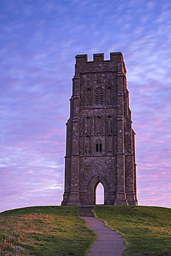 St. Michael's Tower on Glastonbury Tor at dawn in winter, Glastonbury, Somerset, England, United Kingdom, Europe