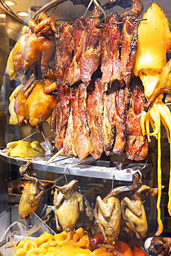 Duck and pork hanging up in window of restaurant, Central, Hong Kong Island, Hong Kong