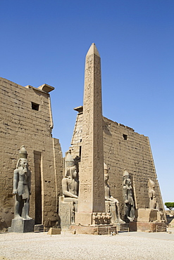 Colossi of Ramses II in front of Pylon, Obelisk, Luxor Temple, UNESCO World Heritage Site, Luxor, Thebes, Egypt, North Africa, Africa