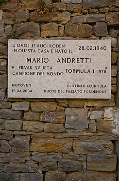 Plaque on wall of previous home of Mario Andretti, Motovun, Central Istria, Croatia, Europe