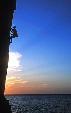 Rock climber in action, Lundy Island, Bristol Channel, United Kingdom, Europe