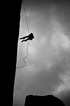 Climber abseiling off a wall, Tsaranoro Massif, southern Madagascar, Africa