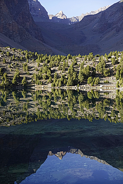 Reflections in a lake in the remote and spectacular Fann Mountains, part of the western Pamir-Alay, Tajikistan, Central Asia, Asia