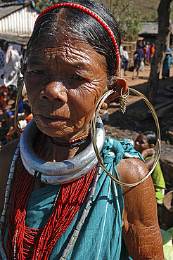 Gadaba tribeswoman in traditional dress with large earrings and necklaces denoting her tribe, Onukudelli, Orissa, India, Asia