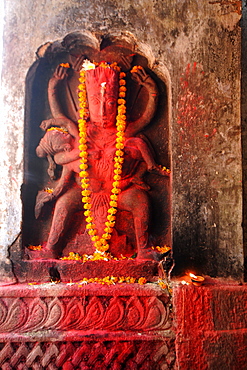 Hayagriva, horse-headed incarnation of Hindu Lord Vishnu, with garland and red powder, Hayagriva Madhava Temple, Hajo, Assam, India, Asia