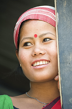 Smiling married woman from the Mishing tribe wearing typical Assamese domestically woven scarf, Majuli Island, Assam, India, Asia