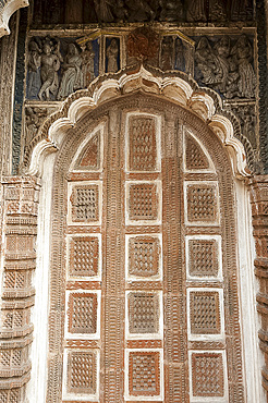 Carved arched door in the 19th century Prataspeswar terracotta temple, built in 1849, in the temple complex, Kalna, West Bengal, India, Asia