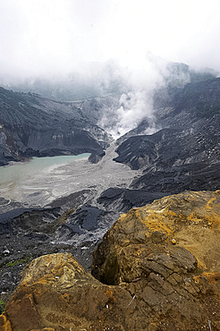 Hot volcanic steam rising into monsoon clouds from Kawah Ratu (Queen's Crater) of Mount Tangkuban, Perahu, Bandung,  Java, Indonesia, Southeast Asia, Asia