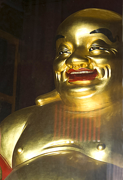 Large golden smiling Buddha in Kek Lok Si Buddhist temple, Air Itam, Georgetown, Penang, Malaysia, Southeast Asia, Asia