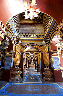 Interior of Thanboddhay Pagoda, showing some of the 100000 Buddhas there, large and small on shelves, Monywa, Sagaing Division, Myanmar (Burma), Asia