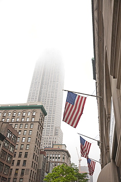 Broadway and Empire State Building shrouded in mist, Manhattan, New York City, New York, United States of America, North America