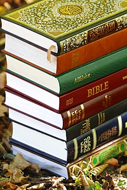 Books of the three monotheistic religions, Christianity, Islam and Judaism, the Torah, Quran and Bible, France, Europe