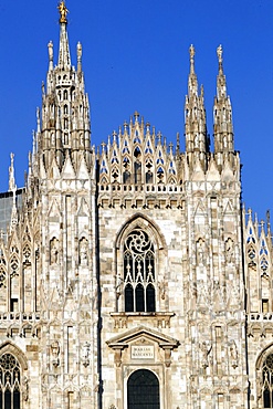 The west facade of the Duomo, the Gothic style cathedral dedicated to St. Mary, Milan, Lombardy, Italy, Europe