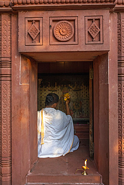 Priest performing ritual in a temple at Goverdan ecovillage, Maharashtra, India, Asia