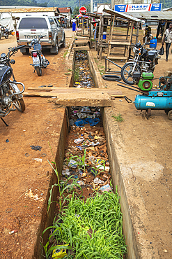 Trash in sewer in Amlame, Togo