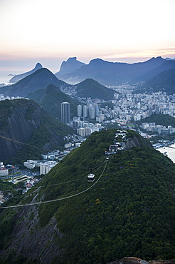 View from the Sugarloaf and the famous cable car at sunset, Rio de Janeiro, Brazil, South America 