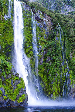 Huge waterfall in Milford Sound, Fiordland National Park, UNESCO World Heritage Site, South Island, New Zealand, Pacific