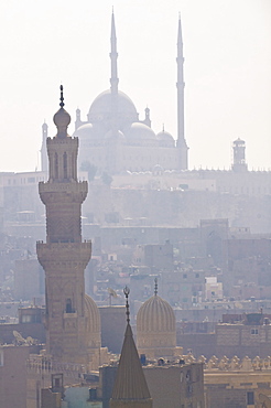 The minarets of the mosques of the old city in the smog, Cairo, Egypt, North Africa, Africa