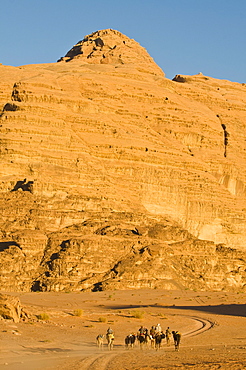 Camel caravan in the stunning desert scenery of Wadi Rum, Jordan, Middle East