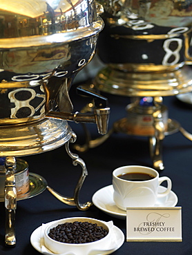 Coffee urn, coffee beans and coffee cup, Jasper, Alberta, Canada, North America