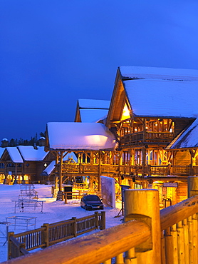 Wiskeyjack Ski Lodge in winter at dusk, Lake Louise, Banff National Park, Alberta, Canada, North America