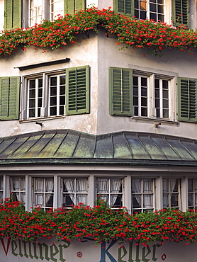 Exterior of a building with window boxes of geraniums, Old Town, Zurich, Switzerland, Europe