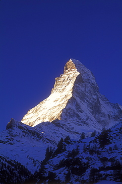 Matterhorn illuminated at sunrise, Zermatt, Valais, Switzerland, Europe