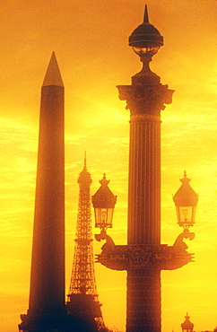 Ornate lamp post and Egyptian Obelisk, Place de la Concorde, and Eiffel Tower in the background, Paris, France, Europe