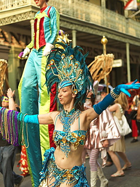 Young woman dressed as Las Vegas show girl, second line parade, French Quarter, New Orleans, Louisiana, United States of America, North America