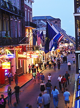 Bourbon Street at dusk with tourists, French Quarter, New Orleans, Louisiana, United States of America, North America