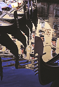 Reflections of gondolas in the water, Bacino Orseolo, Venice, Veneto, Italy, Europe