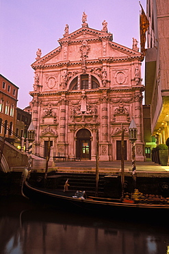 Church of San Moise, Baroque facade with gondola moored in the canal Rio dei Barcaroli, Venice, Veneto, Italy, Europe