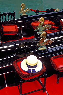 Detail of gondolier's hat and gondolas, Venice, Veneto, Italy, Europe